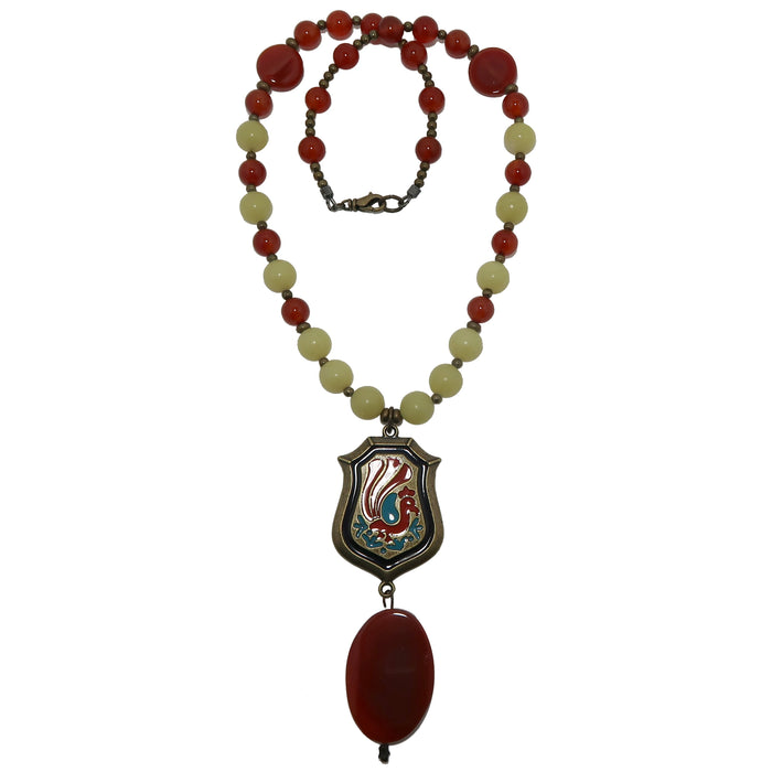  Necklace made of Carnelian Serpentine and brass beads with oval carnelian hanging underneath painted peacock on brass pendant 