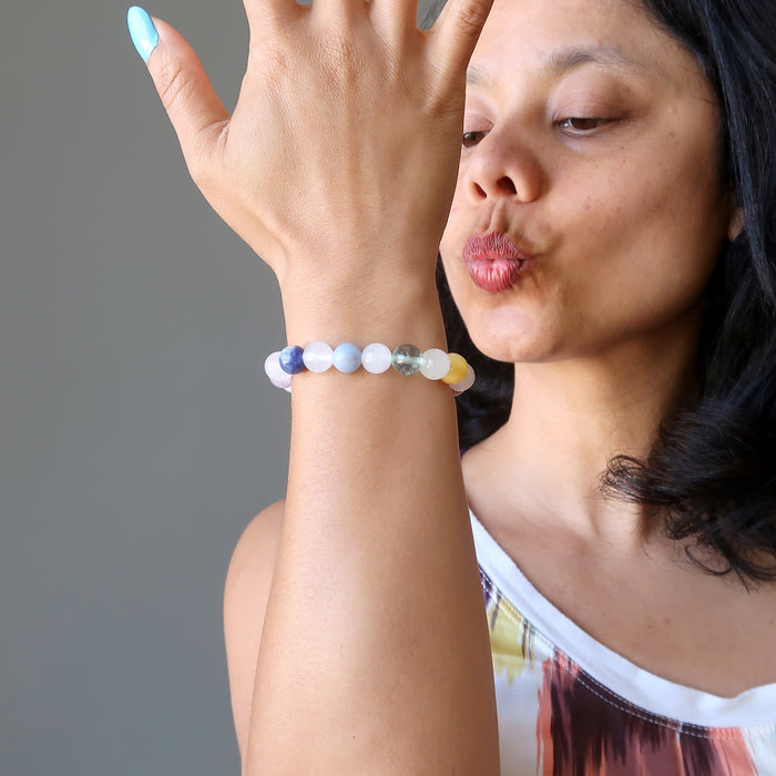 sheila of satin crystals kissing her snow white quartz chakra bracelets