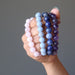 upper chakra bracelet set including purple amethyst, blue sodalite, light blue angelite, pink rose quartz