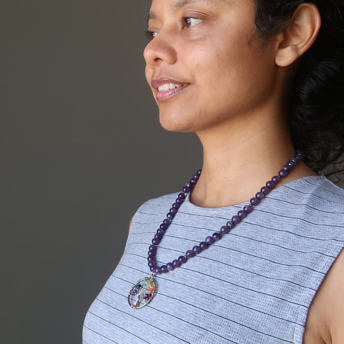 Sheila of Satin Crystals wearing a chakra stone tree of life wire wrapped pendants on beaded amethyst necklace 