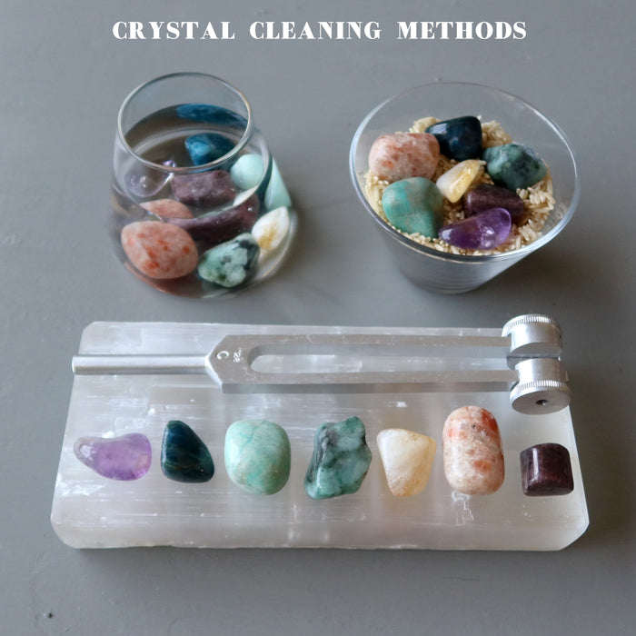 7 chakra stones and tuning fork set showing different cleaning methods