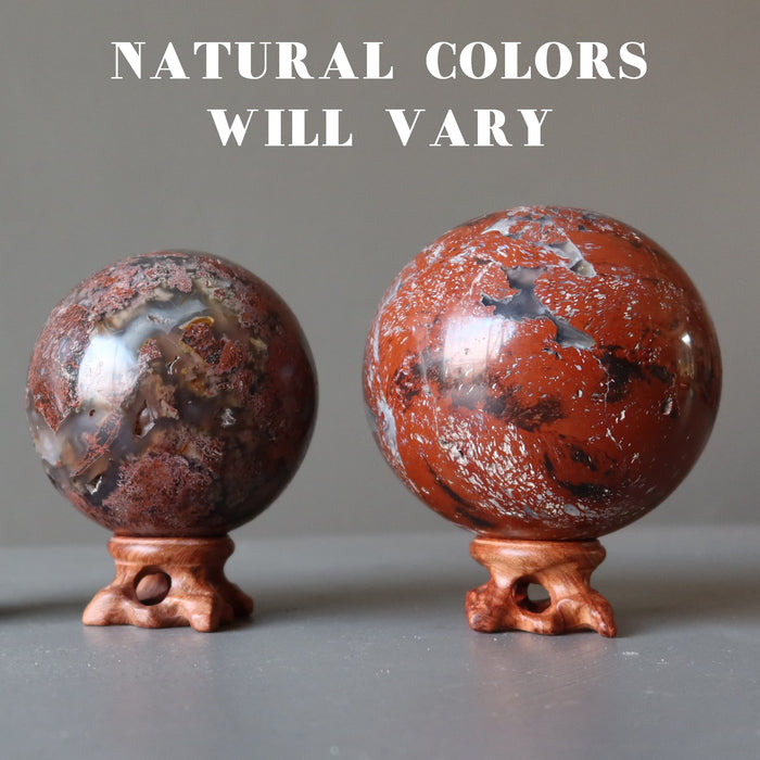 chalcedony jasper crystal balls on fancy wood display stands showing natural colors vary