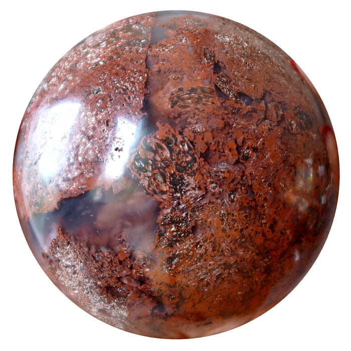 red jasper floating in translucent chalcedony polished into a crystal ball sphere