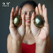 female model holding chalcopyrite eggs