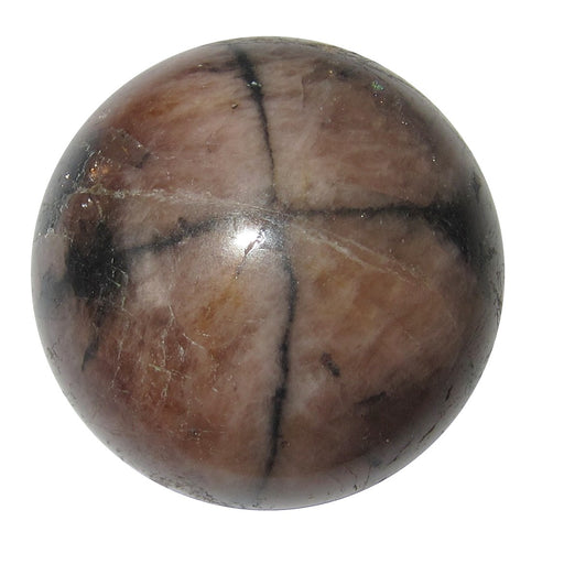 black mineral cross on chiastolite sphere