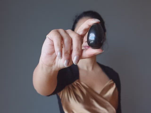 video featuring black tourmaline eggs
