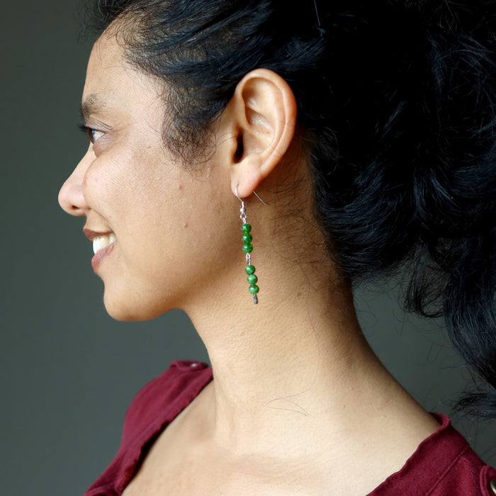 sheila of satin crysals wearing green Chrome Diopside dangling on stars sterling silver earrings