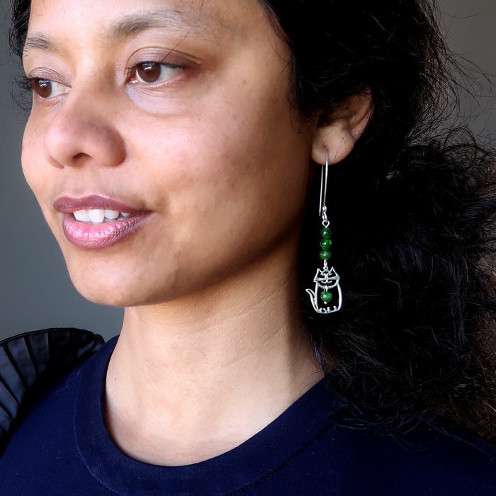 sheila of satin crystals wearing sterling silver cat and green diopside gemstone earrings