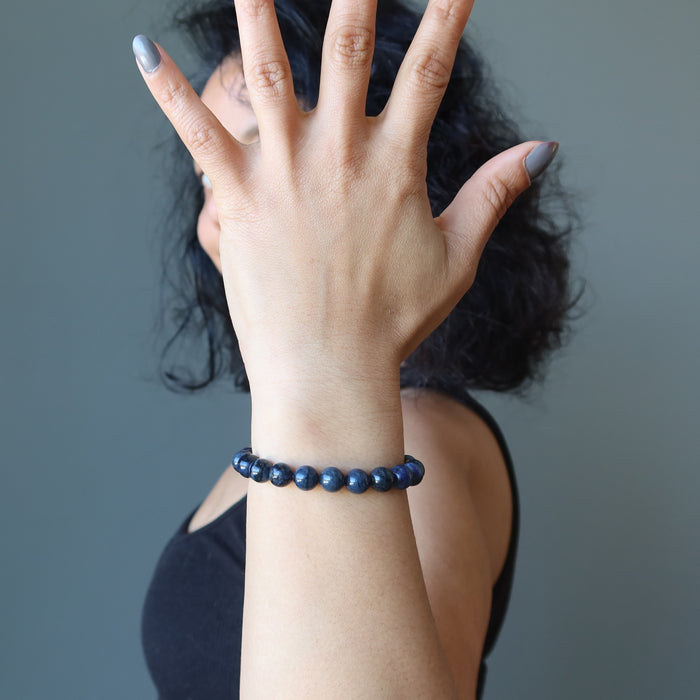 sheila of satin crystals wearing Dumortierite Bracelet on left wrist