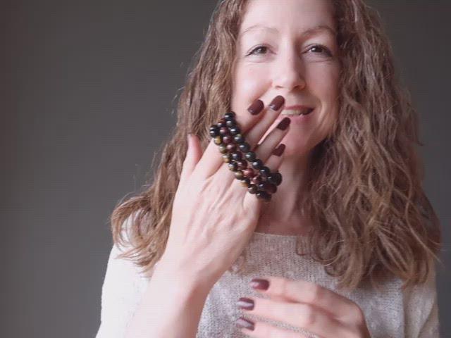 video on wearing red, golden, and blue tigers eye beaded stretch bracelet set 