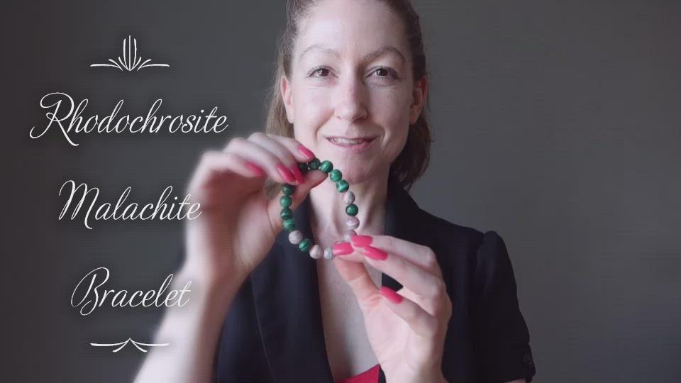 video of female modeling rhodochrosite malchite beaded bracelet