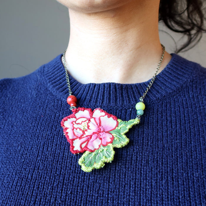 model wearing Red Coral Green Aventurine Serpentine Flower Embroidered Necklace 