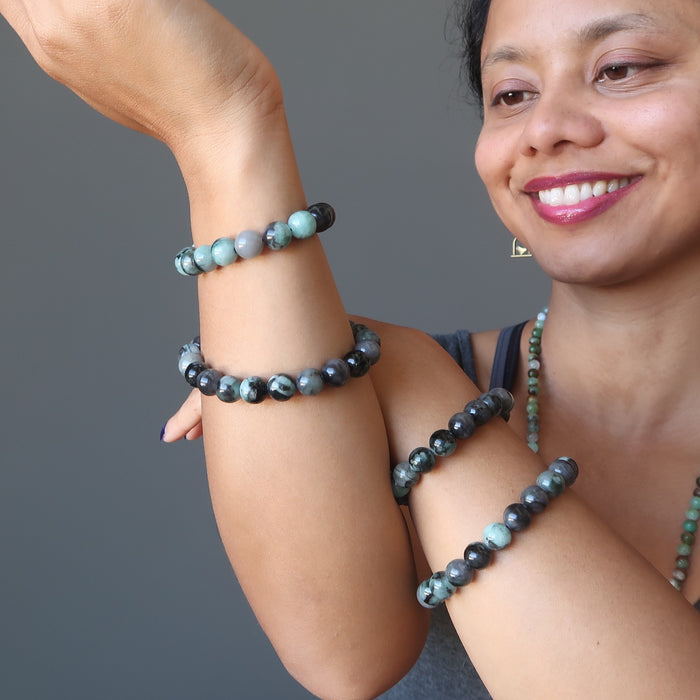sheila of satin crystals wearing 4 emerald bracelets
