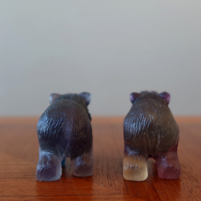 back of two  Carved Rainbow Fluorite Bear Statues