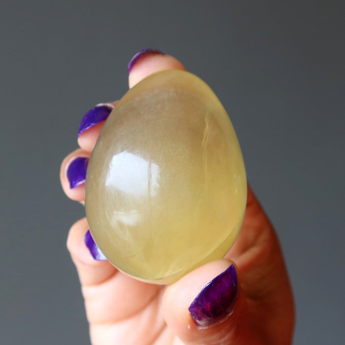holding Yellow Fluorite Egg