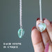 displaying two Green Heart Fluorite necklaces on sterling silver chains