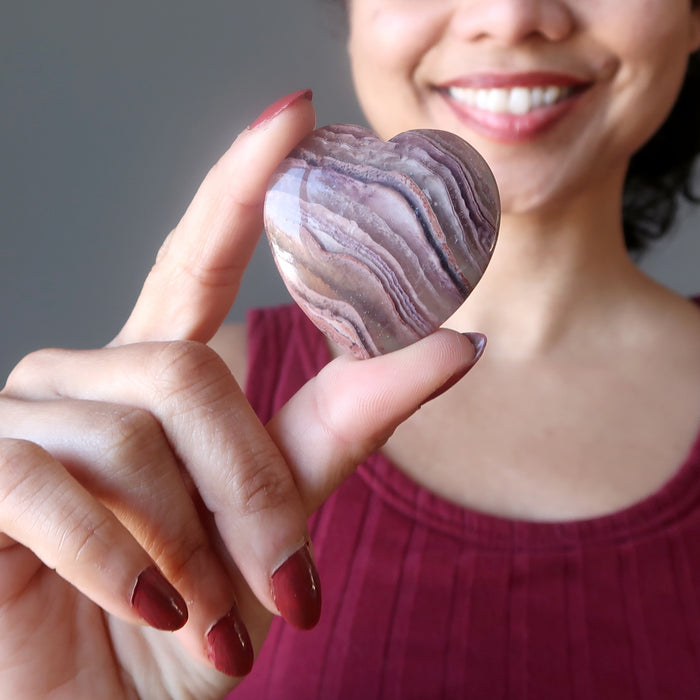 model holding a Fluorite Heart