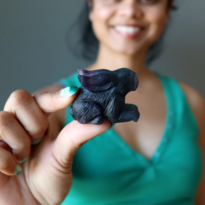 sheila of satin crystals holding holding Purple Fluorite Rabbit Figurine