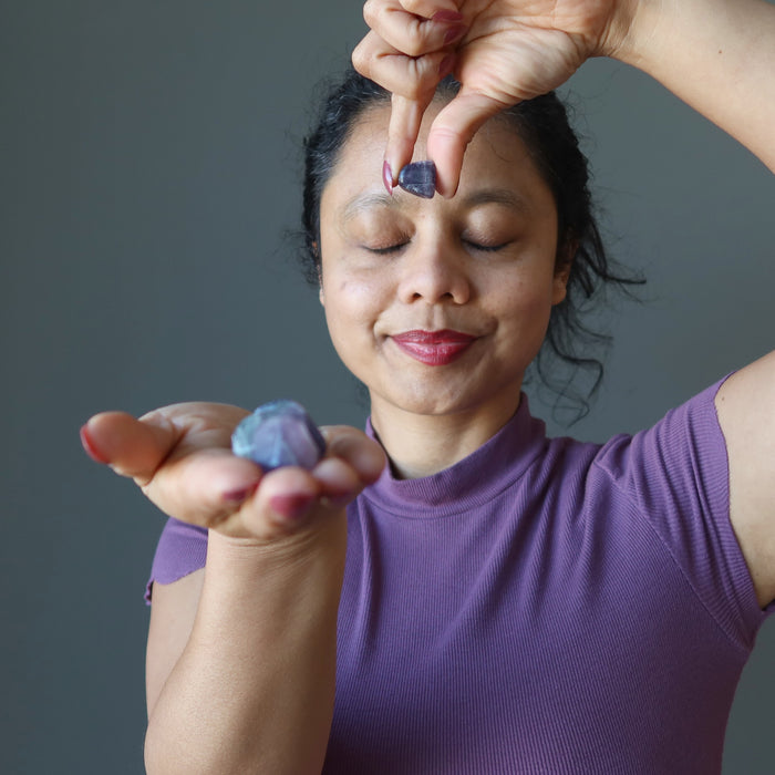 sheila of satin crystals meditating with fluorite tumbled set
