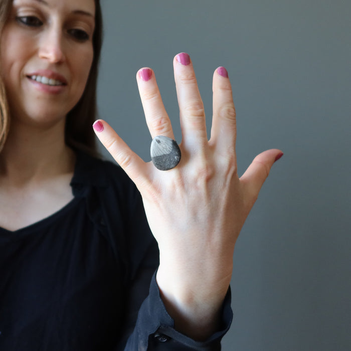 female model wearing Fossil coral ring 