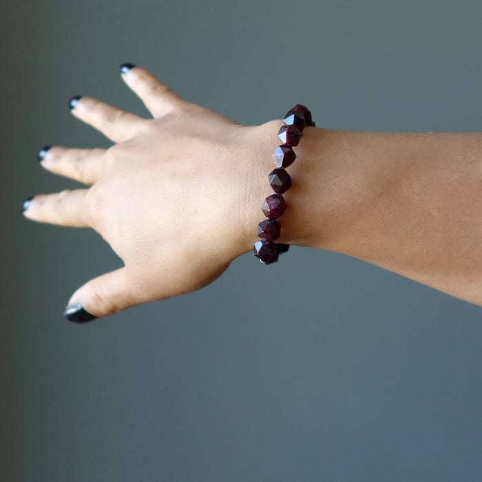 hand wearing a Faceted Garnet Bracelet