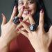 woman wearing two oversized hematite cluster rings
