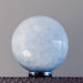 blue calcite sphere on hematine ring stand