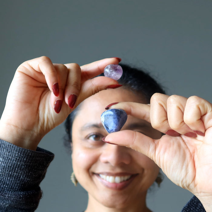 Sheila holding tumbled Amethyst and Sodalite 