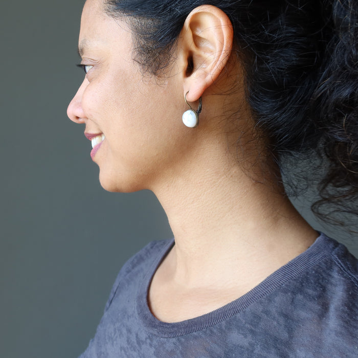 sheila of satin crystals wearing howlite earrings
