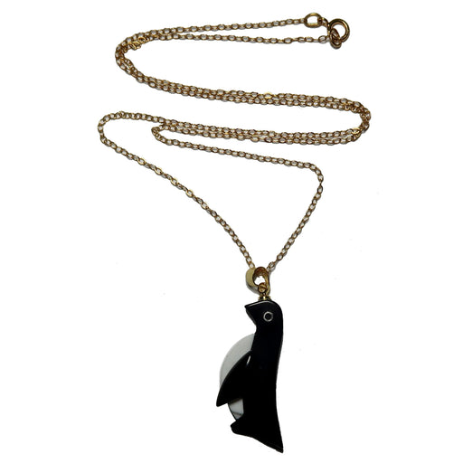 black onyx and white howlite penguin pendant on 14 karat gold necklace chain