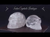 video on clear quartz skull carvings