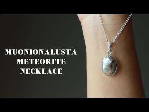 video featuring hand holding muonionalusta necklace