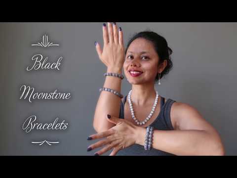 video on wearing black moonstone round beaded stretch bracelets