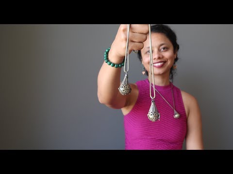 video featuring moldavite locket necklaces