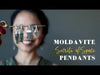 video featuring moldavite pendants