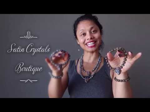video on wearing faceted labradorite and wolf head beaded stretch bracelets