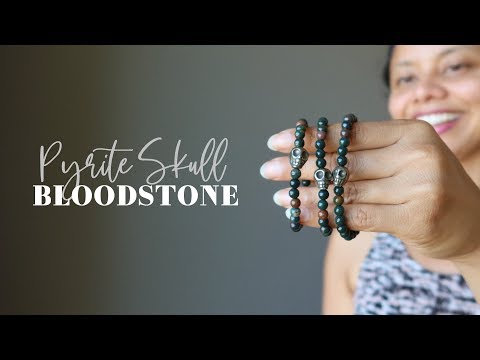 video on wearing pyrite skull and round bloodstone beaded stretch bracelet