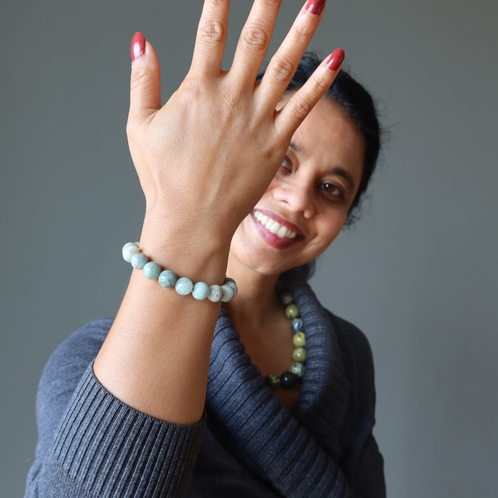 female wearing jade bracelet