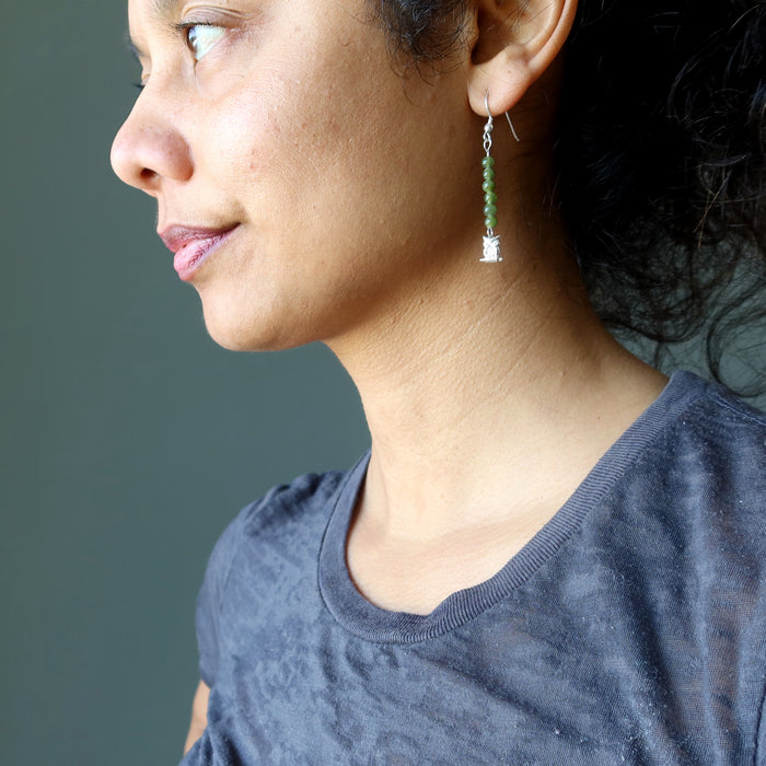 sheila of satin crystals wearing jade owl earrings