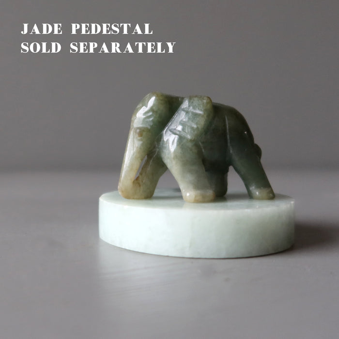 jade elephant on jade pedestal