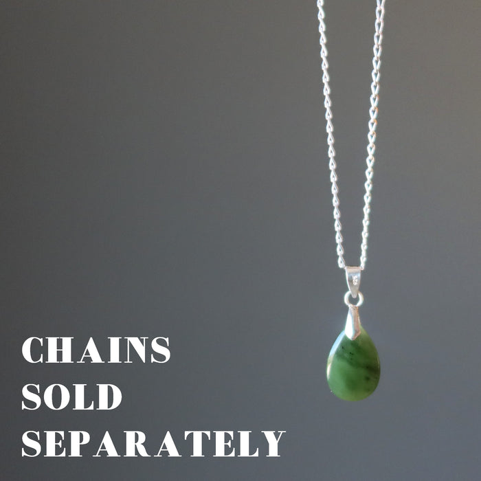 hand holding jade pendant on chain which is sold separately
