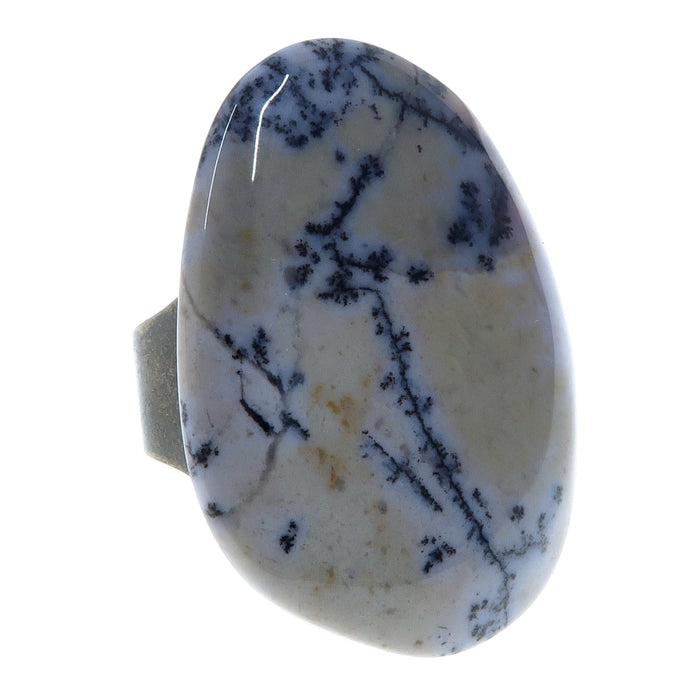 purple and yellow jasper with black dendrites polished into a freeform cabochon and set on an adjustable antique bronze ring