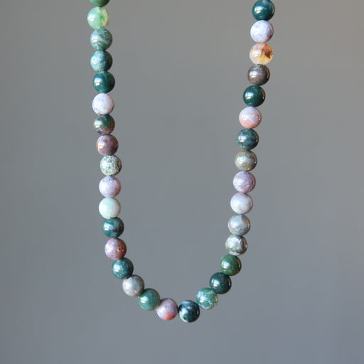 displaying lower portion of Earth Colors Round Bead Jasper Necklace