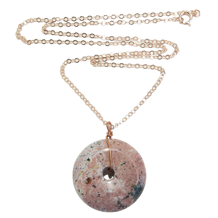 pink spotted picture jasper donut amulet stone on 14 karat rose gold necklace chain