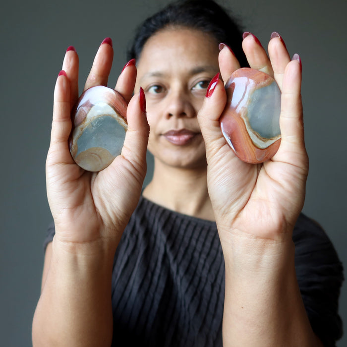 sheila of satin crystals holding polychrome jasper crystals in her palms