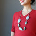 woman wearing designer sesame jasper necklace