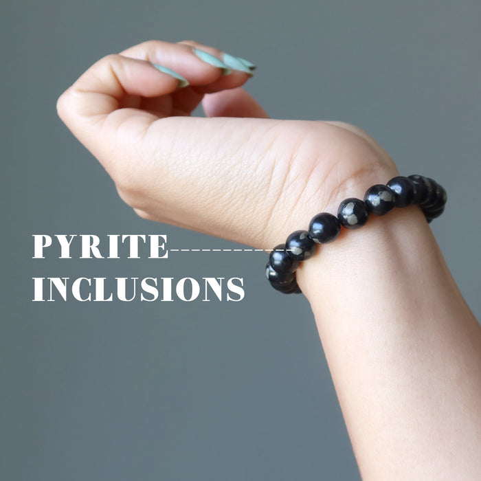 hand wearing jet pyrite bracelet