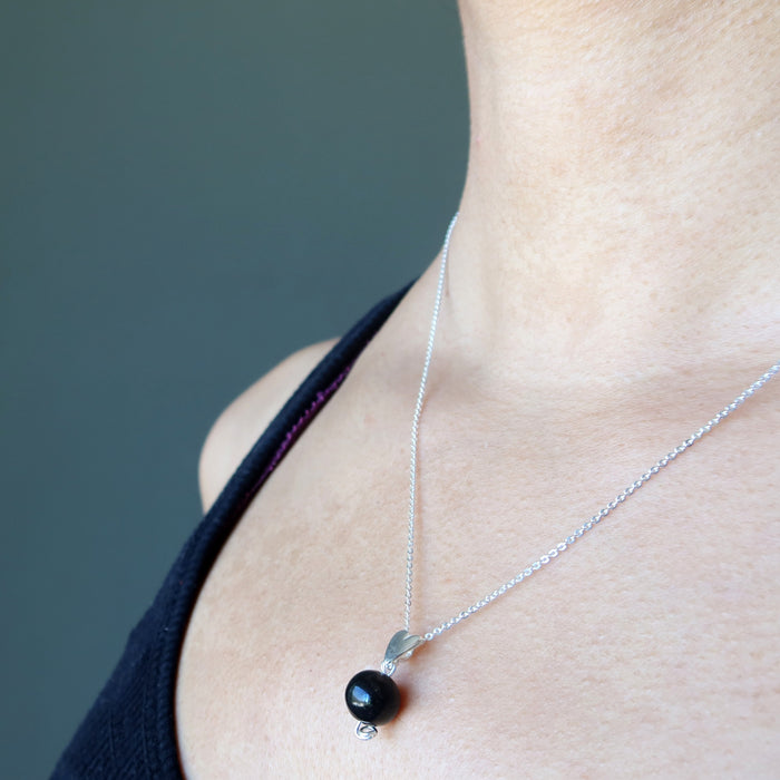 jet stone sterling silver heart necklace on neck