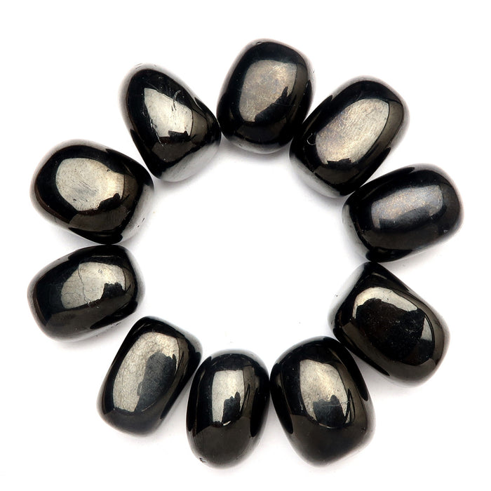 black jet tumbled stones arranged in a circle