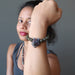 sheila of satin crystals modeling wolf head and labradorite beaded bracelet